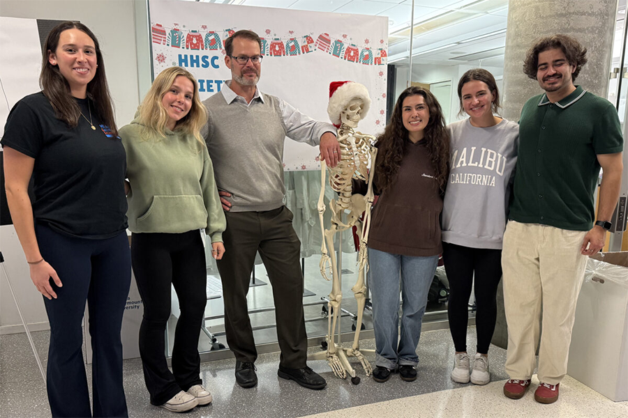 Health and Human Sciences Society standing in a group